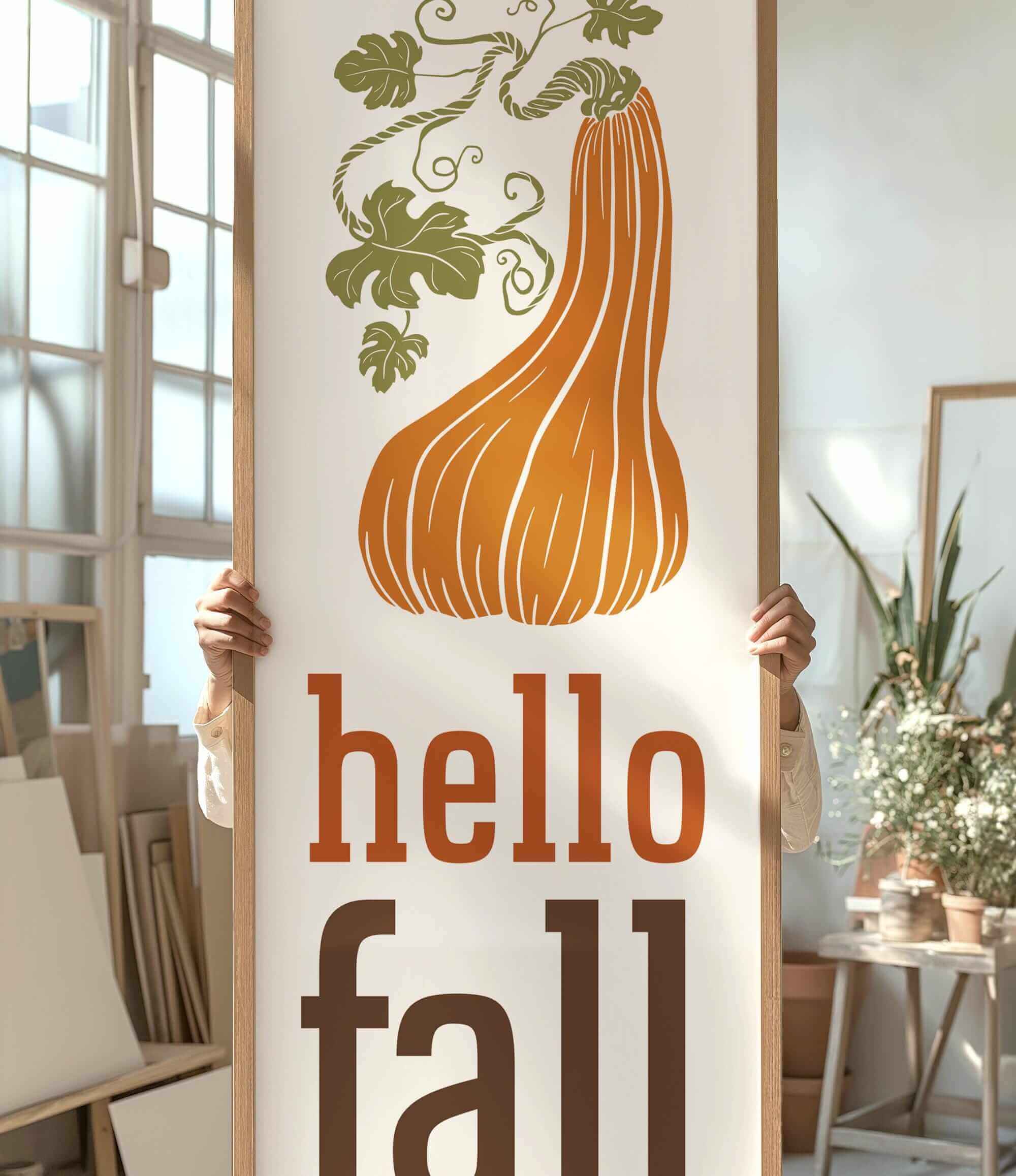 a person holding a sign that says hello fall