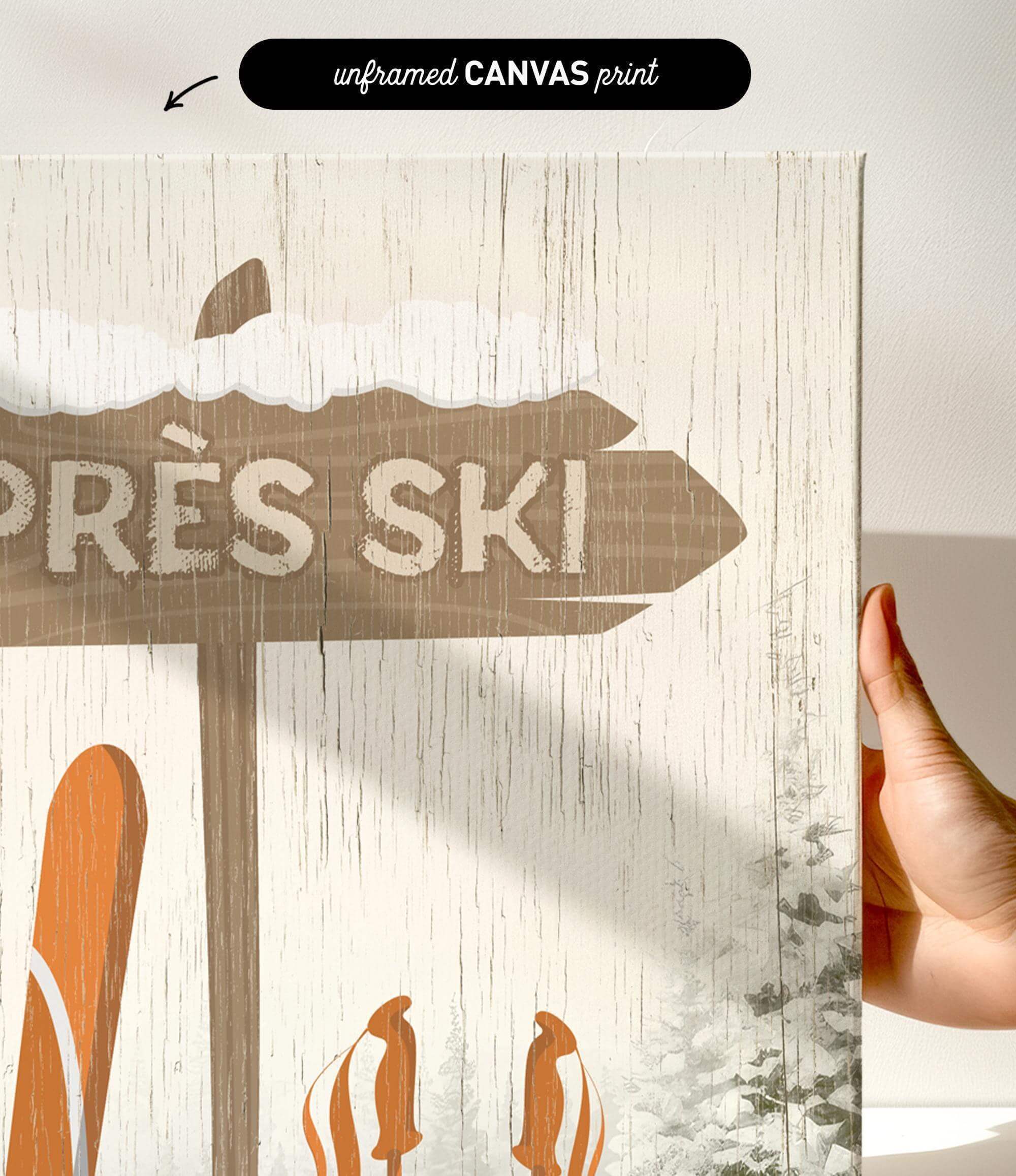 a hand holding up a sign with skis on it