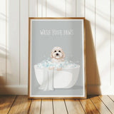A framed poster with a cute dog sitting in a bathtub filled with bubbles, accompanied by the text "WASH YOUR PAWS".