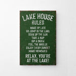 a sign on a wall that says lake house rules