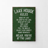 a sign on a wall that says lake house rules