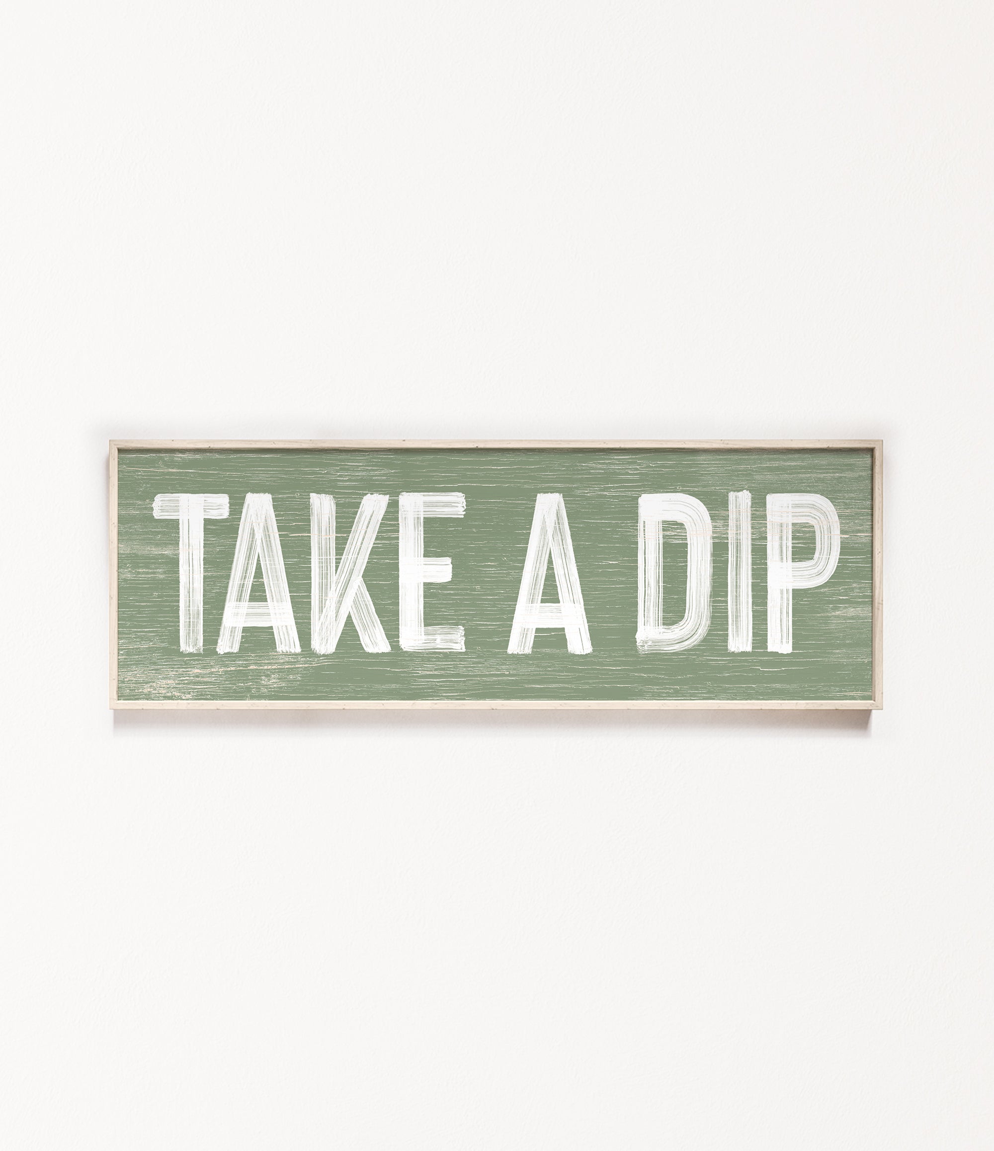 a wooden sign that says take a dip