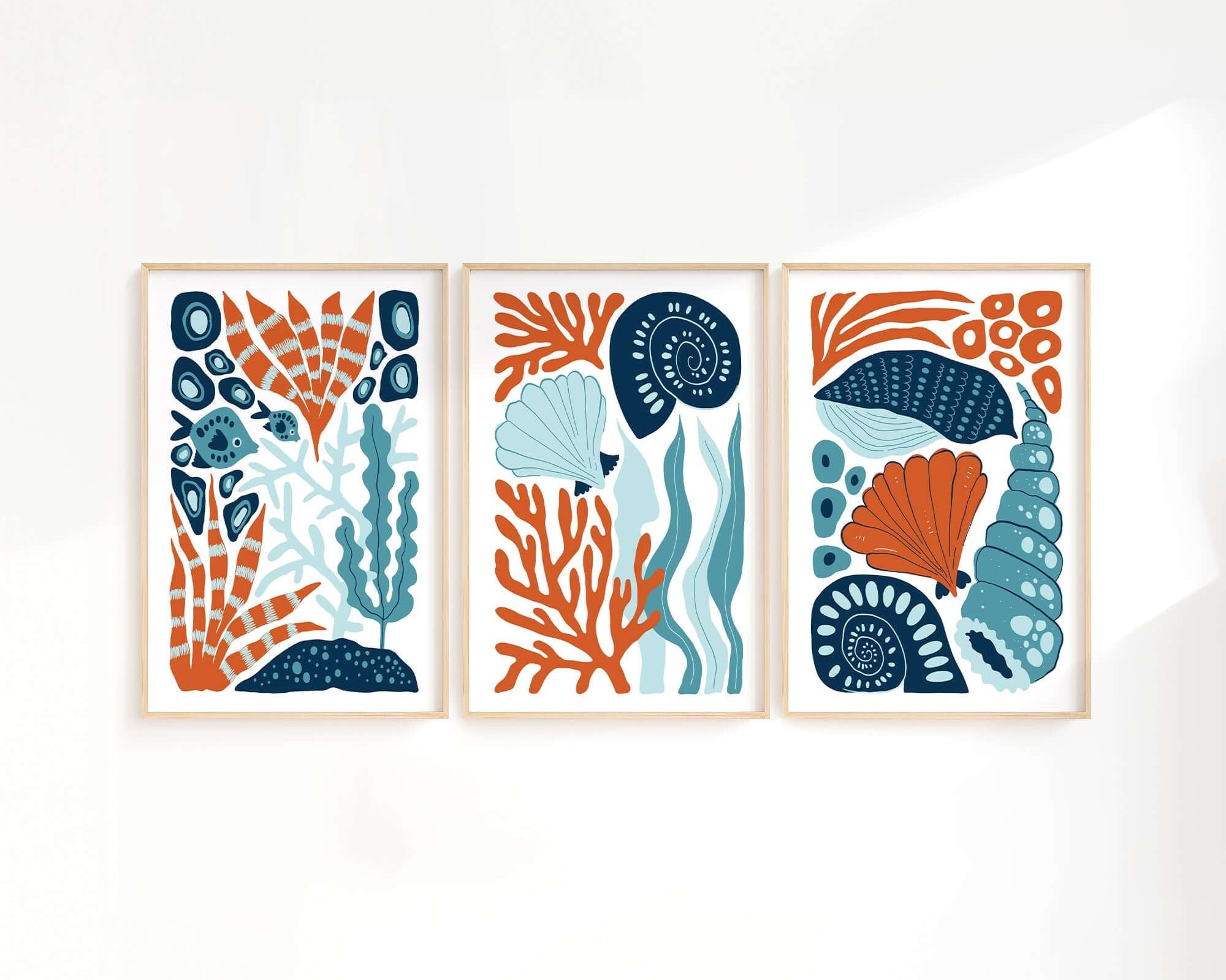 The Ocean Blocks Triptych | Set of Three Prints | 339 showcases abstract botanical and seashell designs in orange, blue, and teal—perfect as striking wall art for modern home decor.
