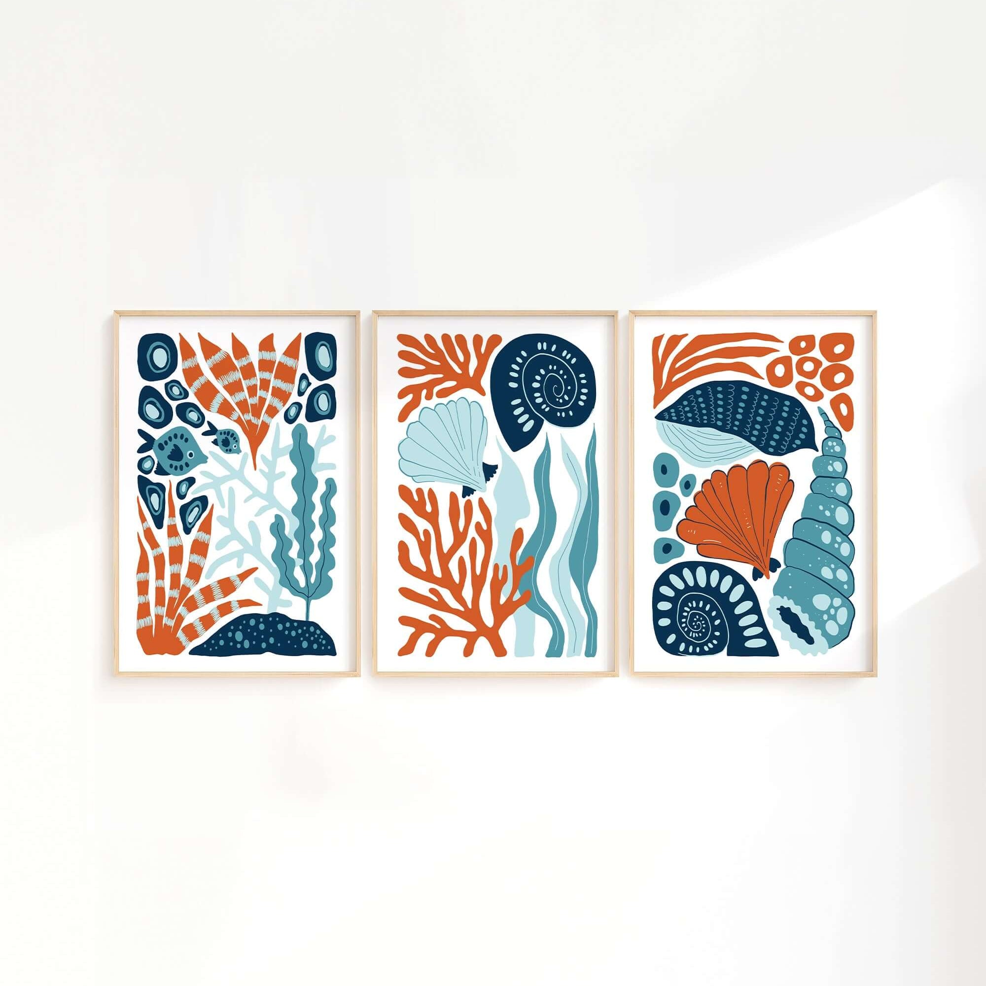The Ocean Blocks Triptych | Set of Three Prints | 339 showcases abstract botanical and seashell designs in orange, blue, and teal—perfect as striking wall art for modern home decor.