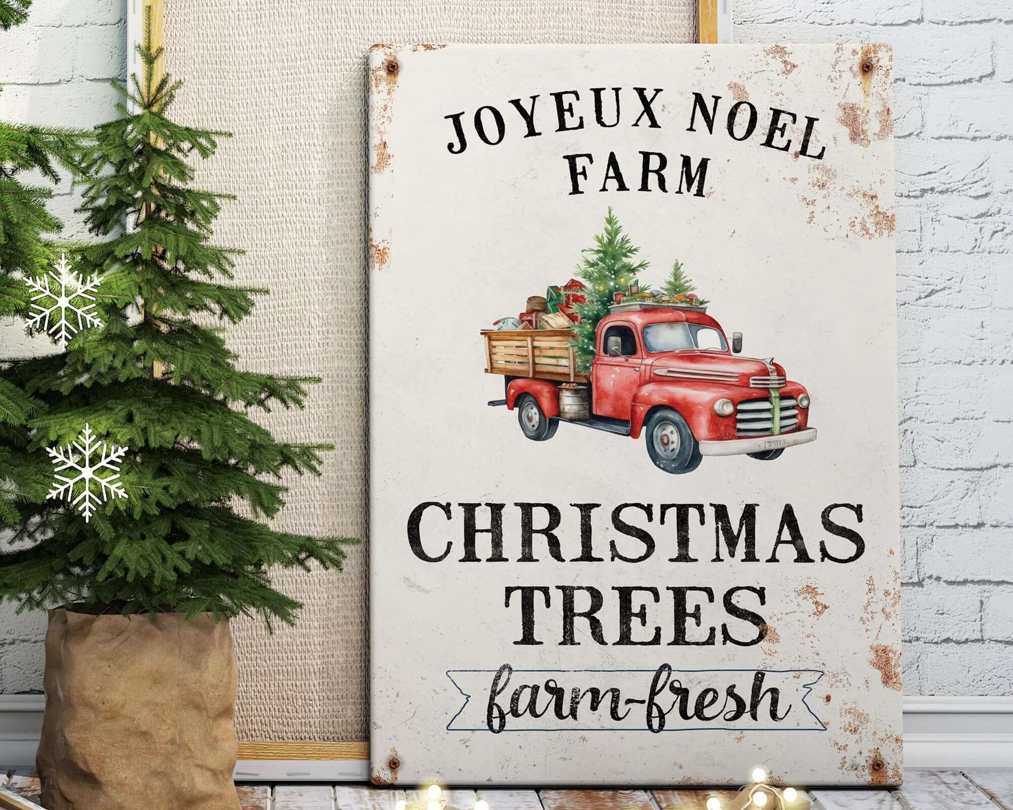 a christmas tree farm sign next to a christmas tree