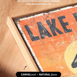 a picture of a lake sign on a wooden frame