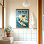 a bathroom with a framed poster of a woman surfing, a towel hanging on the wall, and a potted plant on the floor.