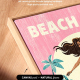 a vibrant, colorful artwork with the word "BEACH" prominently displayed in the center. The artwork is framed in a natural frame, and the text indicates that it is a canvas print.