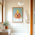 a bathroom with a framed illustration of a dog in a bathtub, featuring a yellow rubber duck. The bathroom has white tiles and a potted plant on the windowsill.