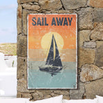 a sail away sign on a stone wall