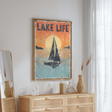a picture of a sailboat on a wall above a dresser