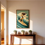 a wooden table with three potted plants on it, and a framed illustration of a woman surfing on a wave hanging on the wall above the table.