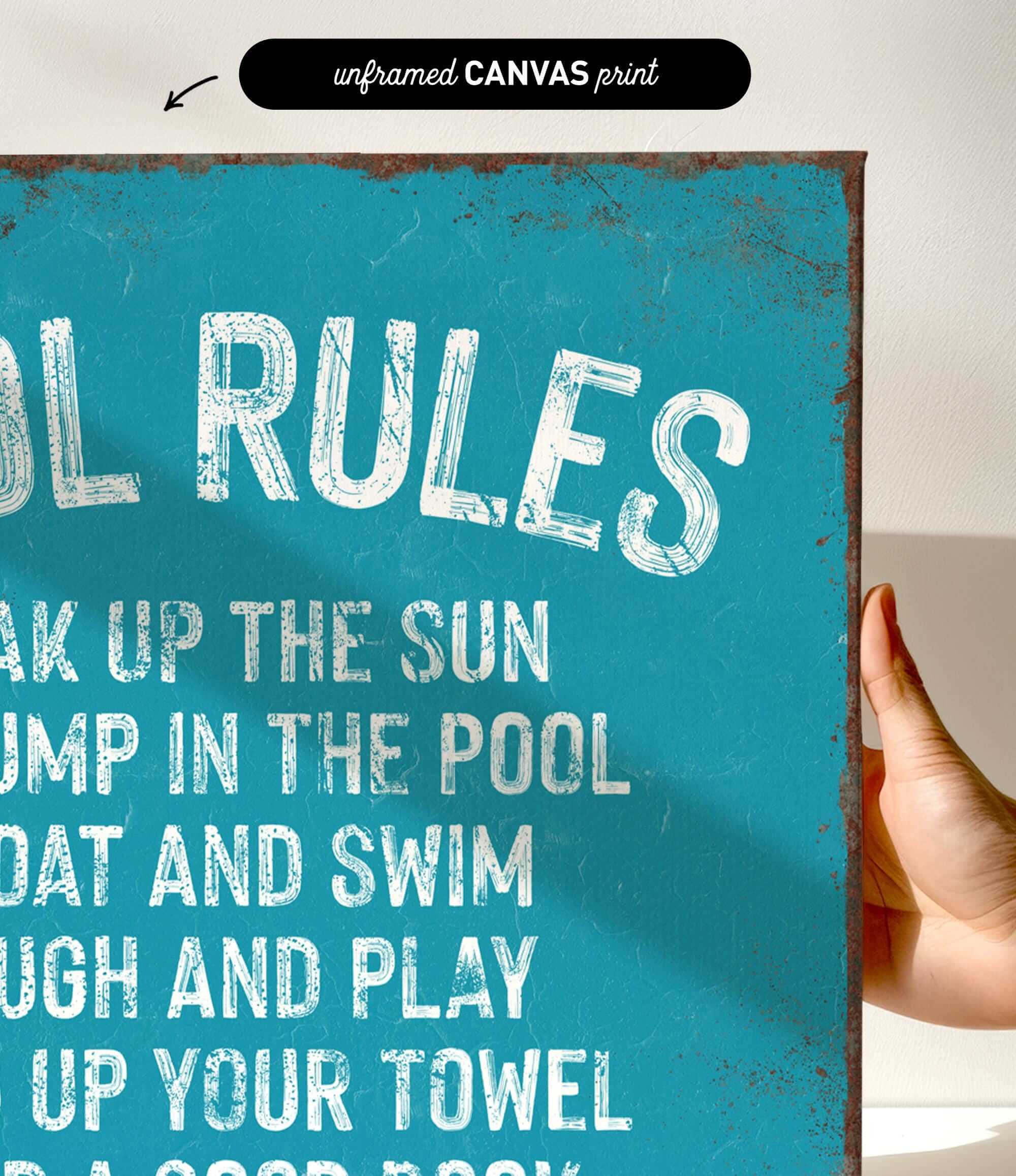 a hand holding a sign that says pool rules