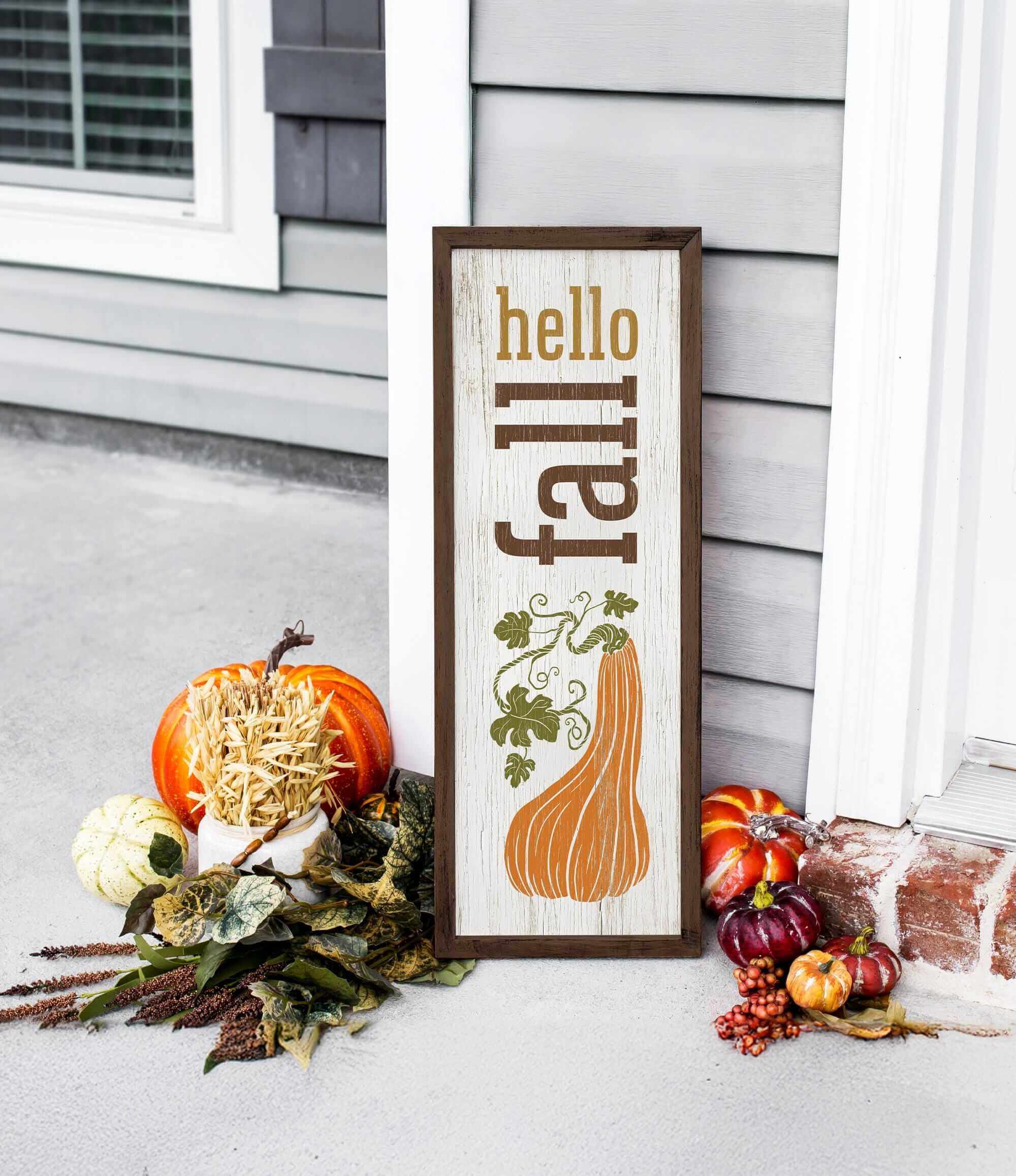 a wooden sign sitting on the side of a building