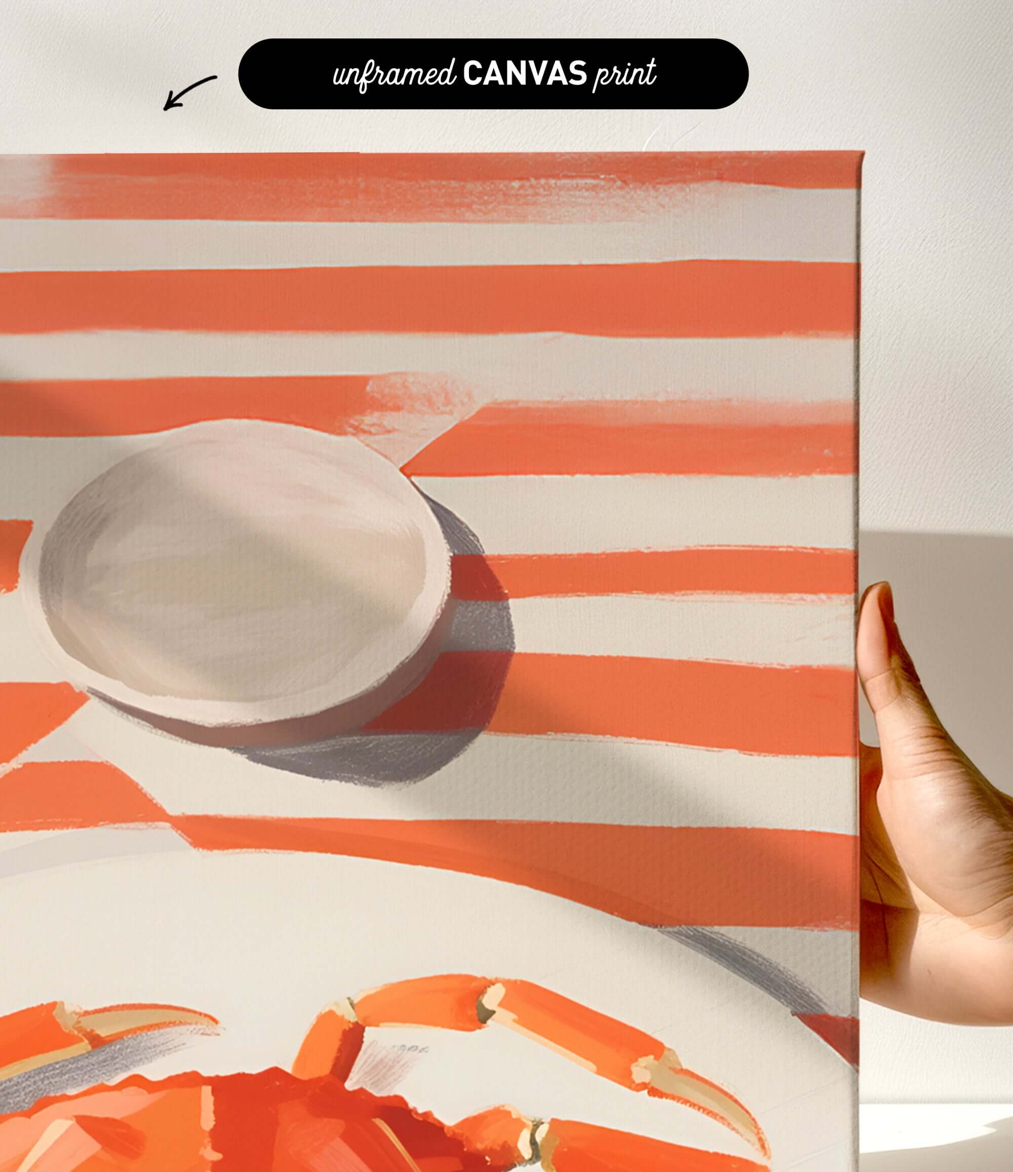 The image is a canvas print featuring a large crab and a white plate with a red rim, set against a striped background.