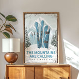 a poster of skis on a wall above a dresser