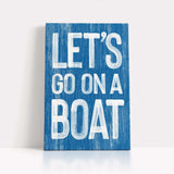 a wooden sign that says let&#39;s go on a boat