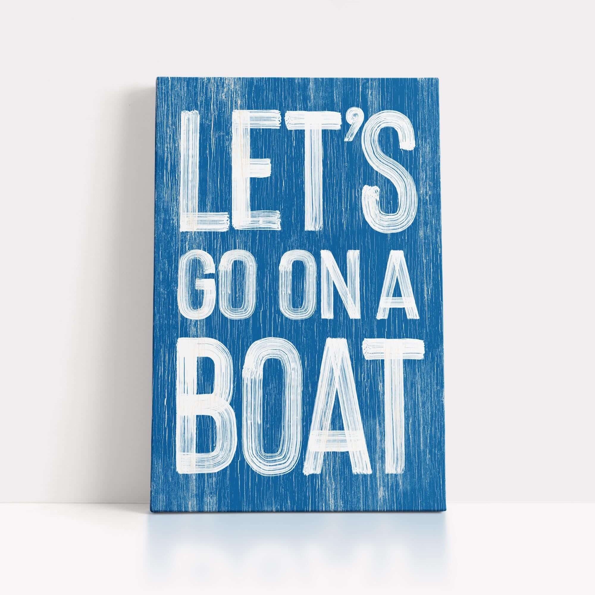 a wooden sign that says let's go on a boat