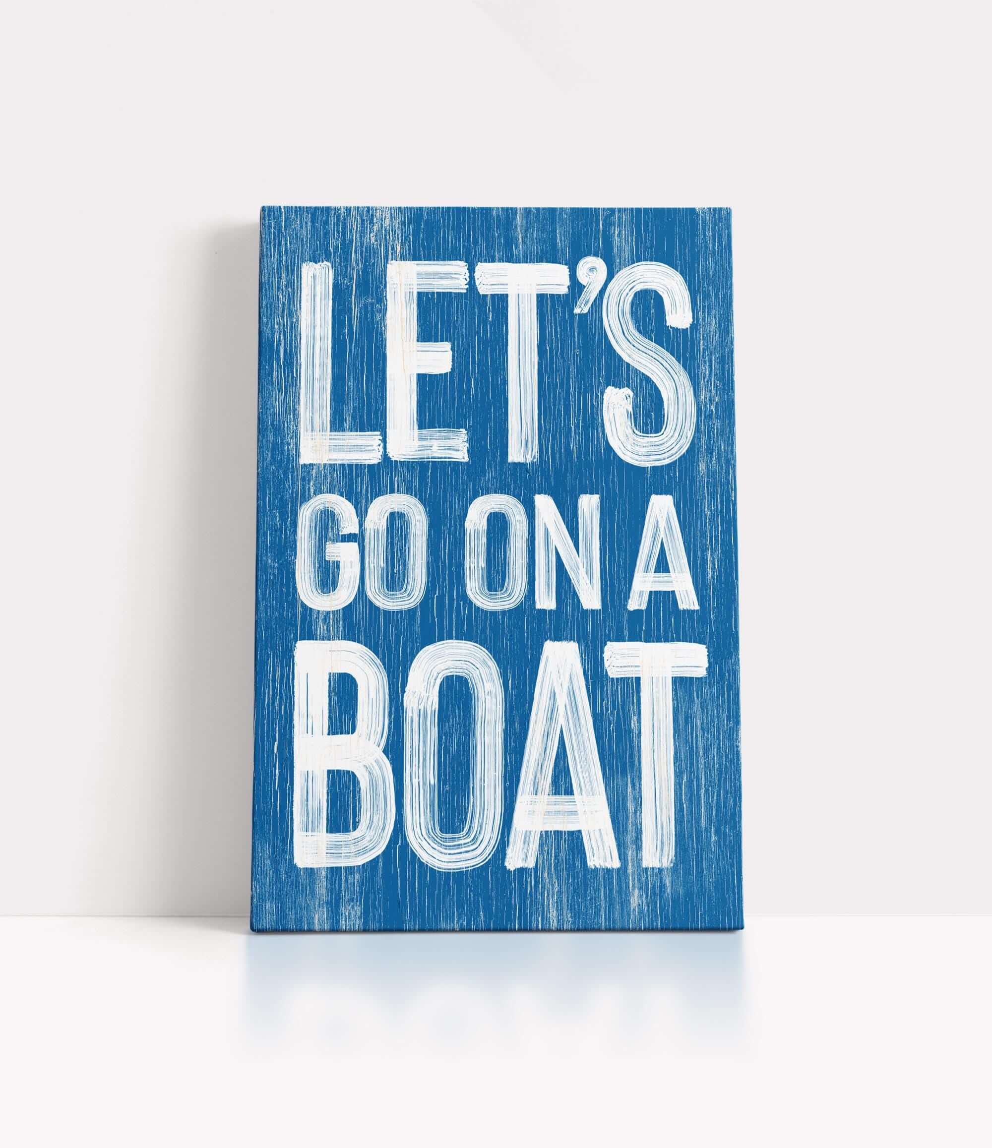 a wooden sign that says let&#39;s go on a boat