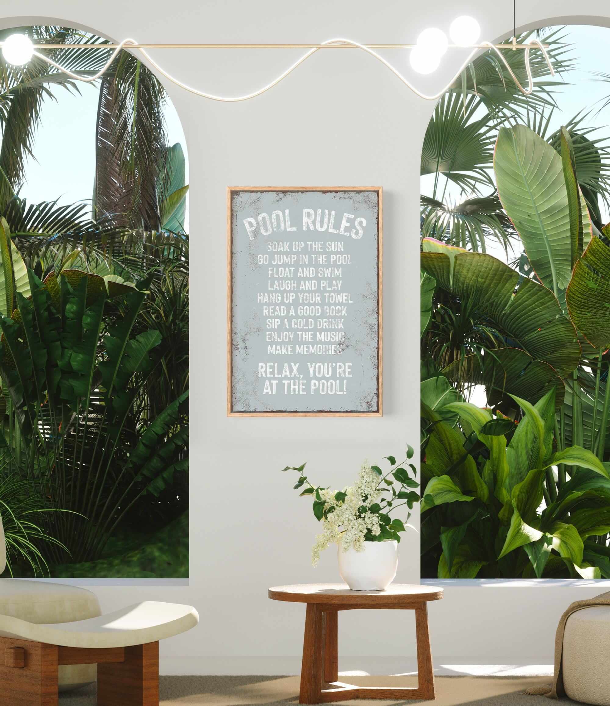 a room with a potted plant and a sign on the wall