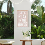 a living room with a plant and a sign on the wall