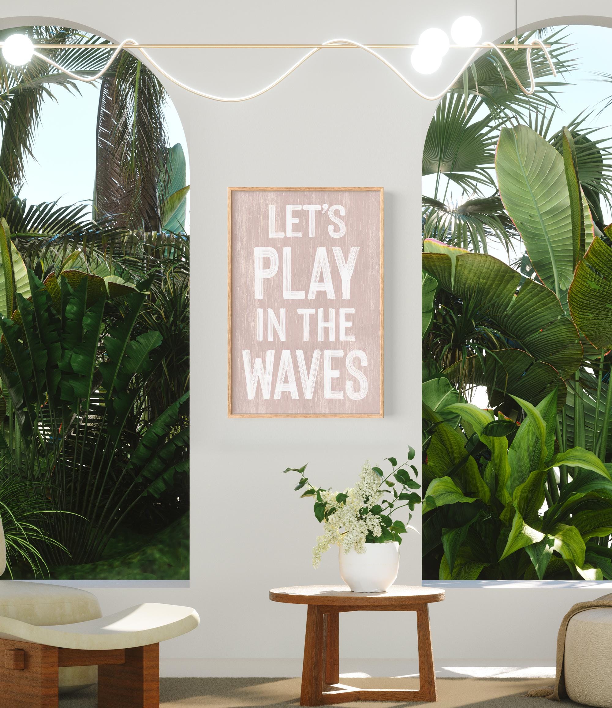 a living room with a plant and a sign on the wall