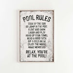 a sign on a wall that says pool rules