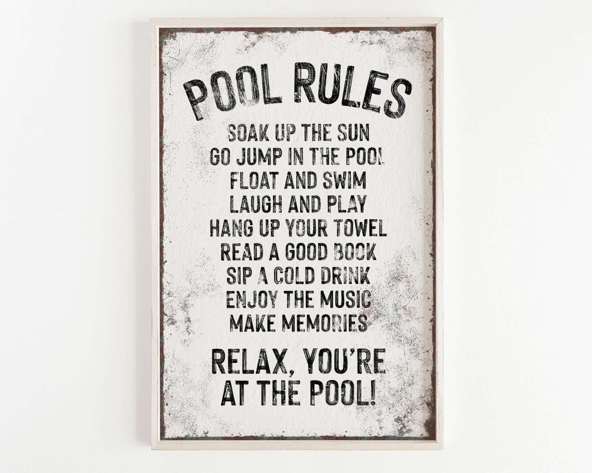 a sign on a wall that says pool rules