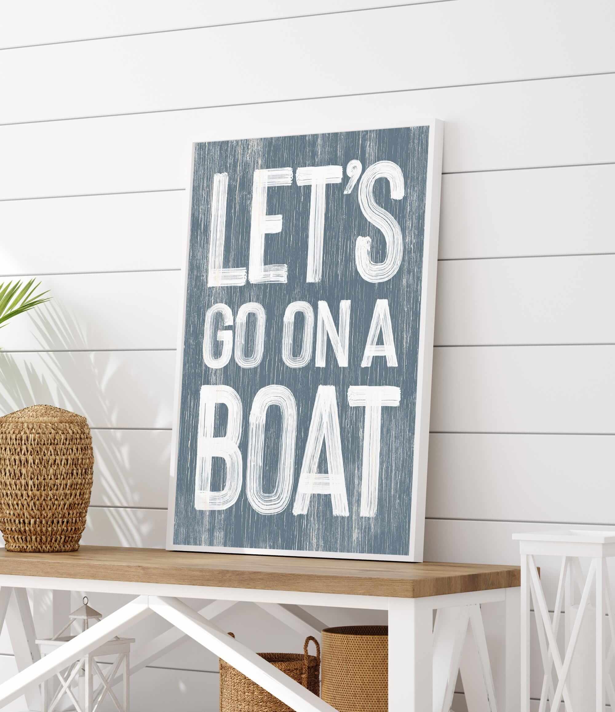 a wooden sign that says let&#39;s go on a boat