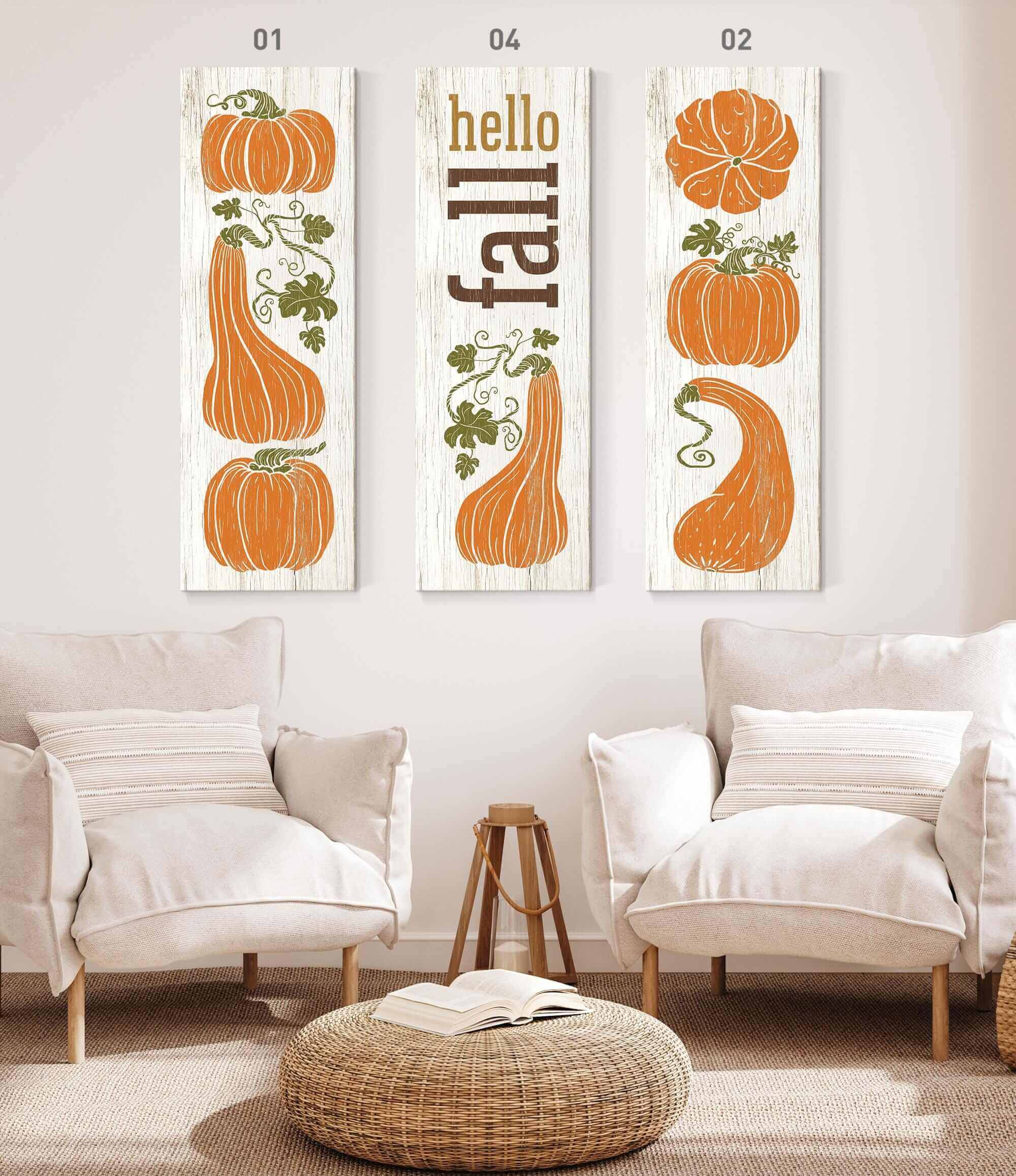 a living room with two chairs and two pumpkins