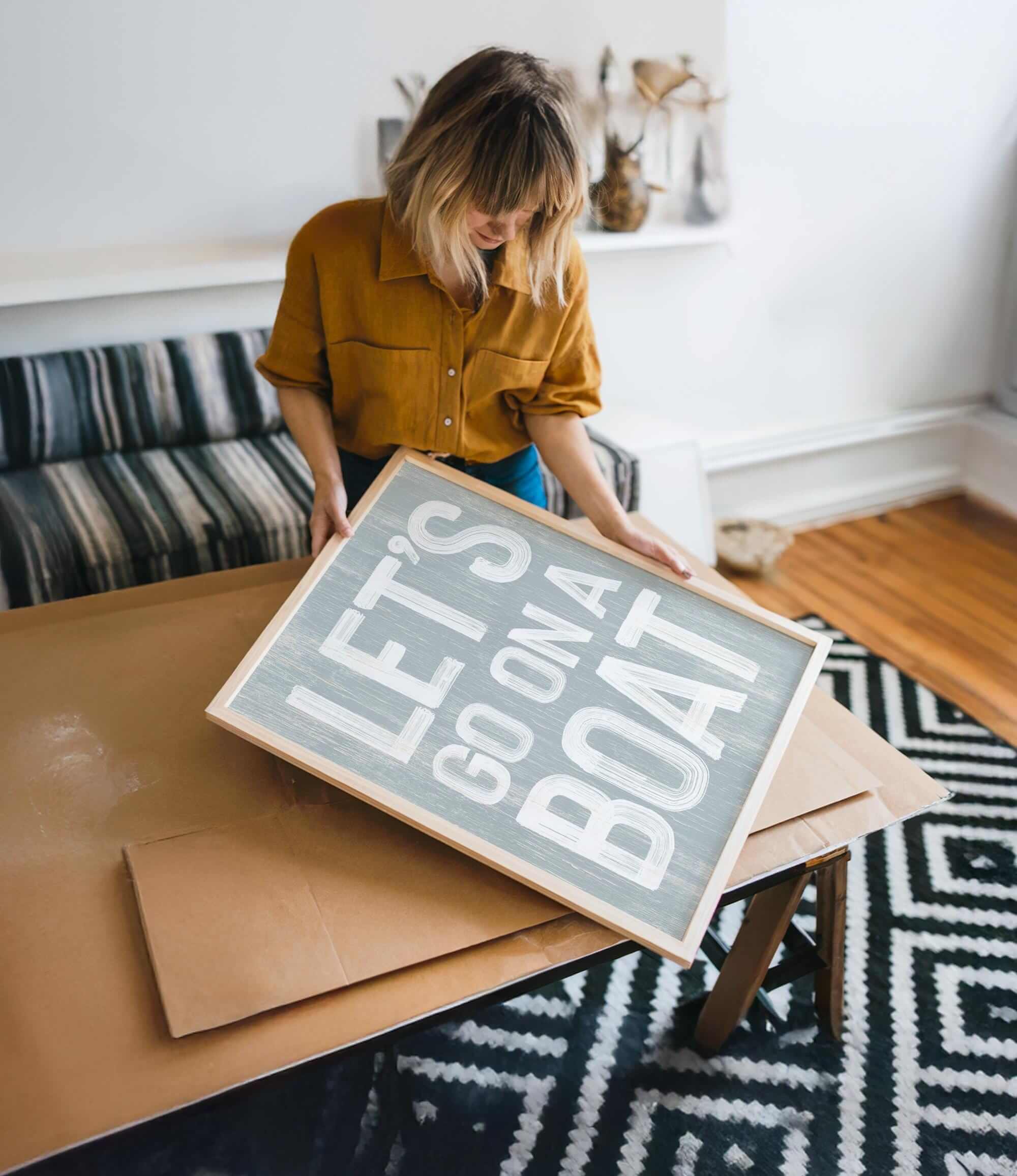 a woman holding a sign that says let&#39;s do what you want