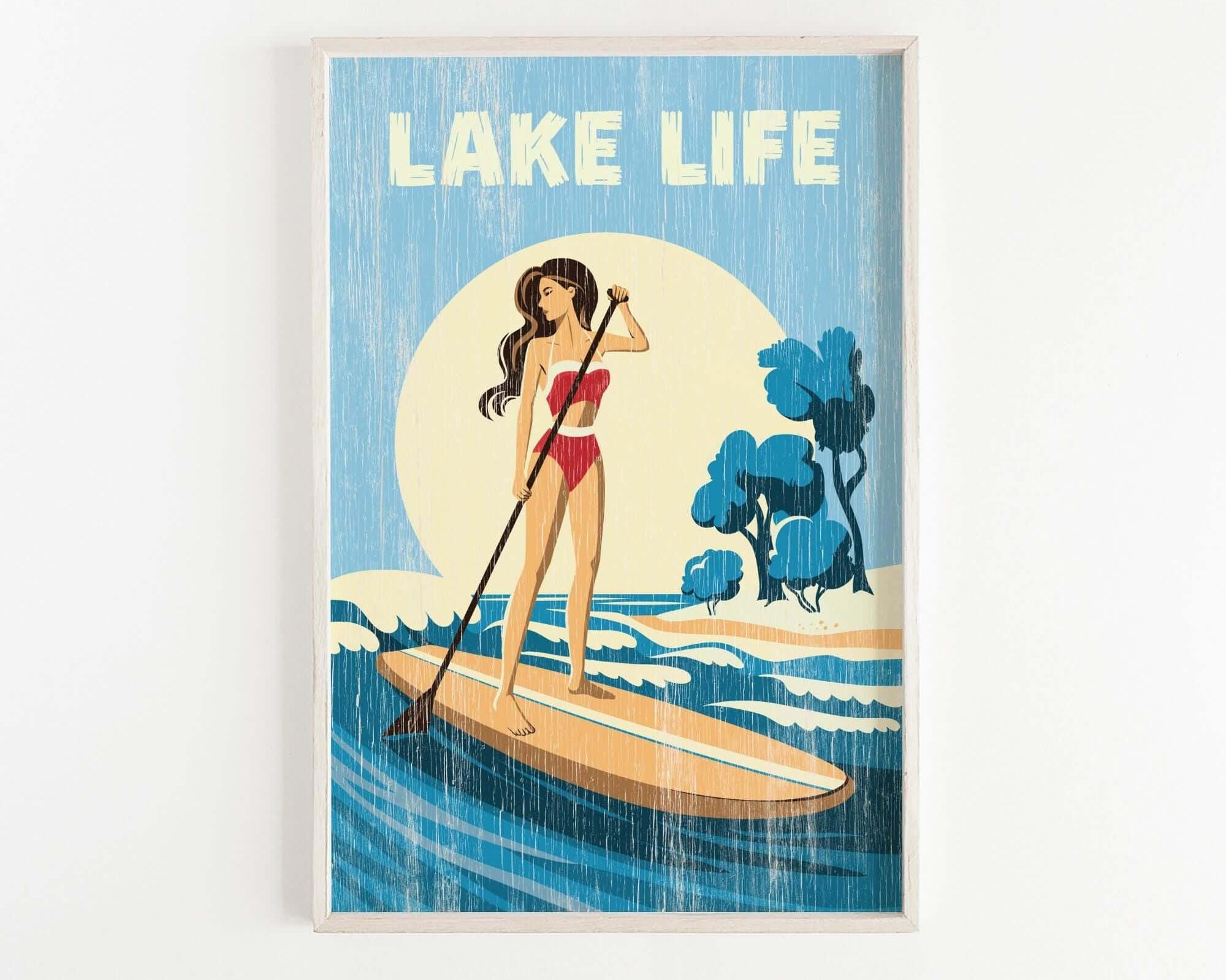 A woman in a red swimsuit is paddleboarding on a blue ocean, with a yellow sun and blue trees in the background.