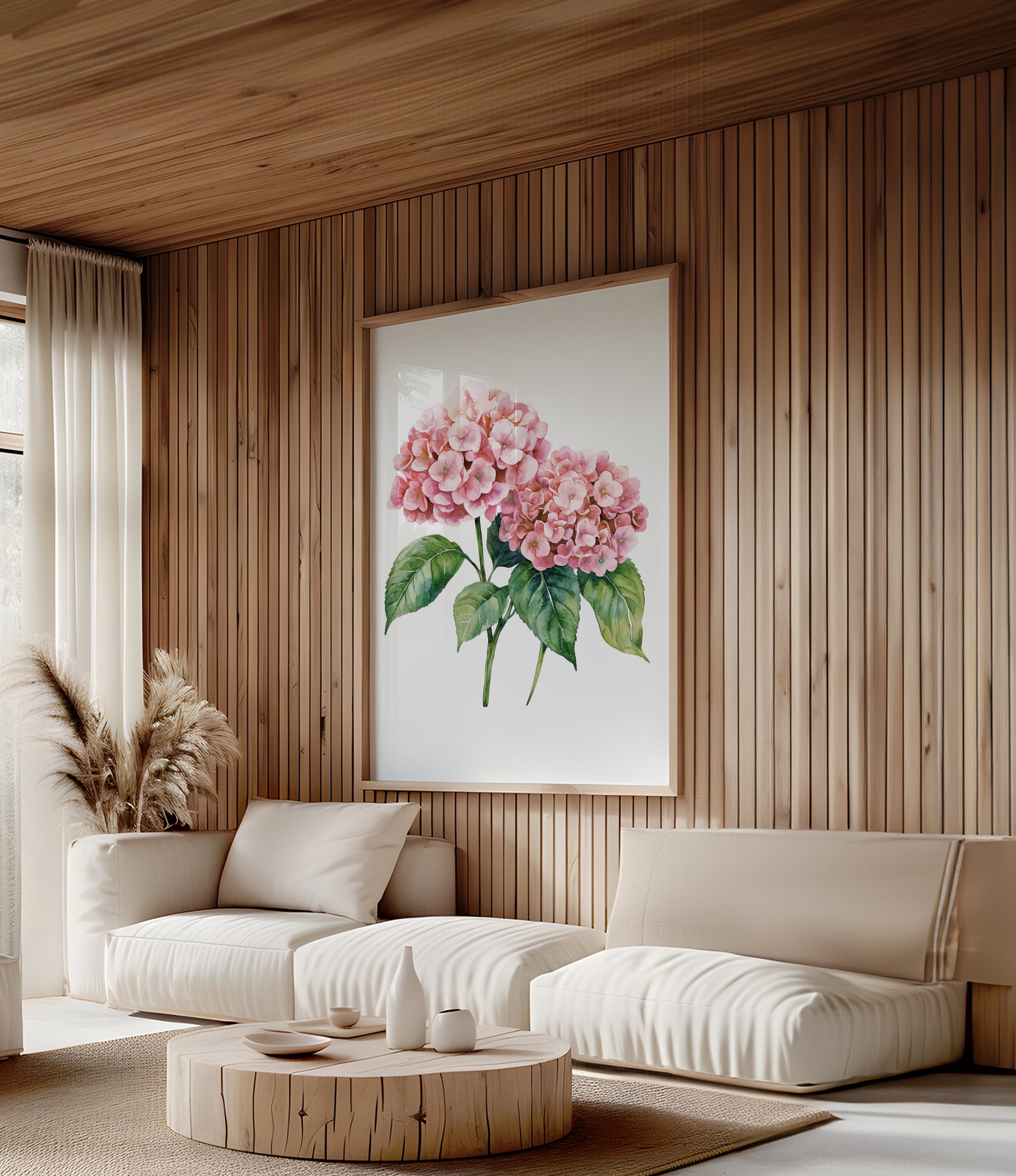 a cozy living room with a large floral painting hanging on the wall, featuring a vibrant pink hydrangea flower. The room is furnished with a sofa and a coffee table, creating a comfortable and inviting atmosphere.