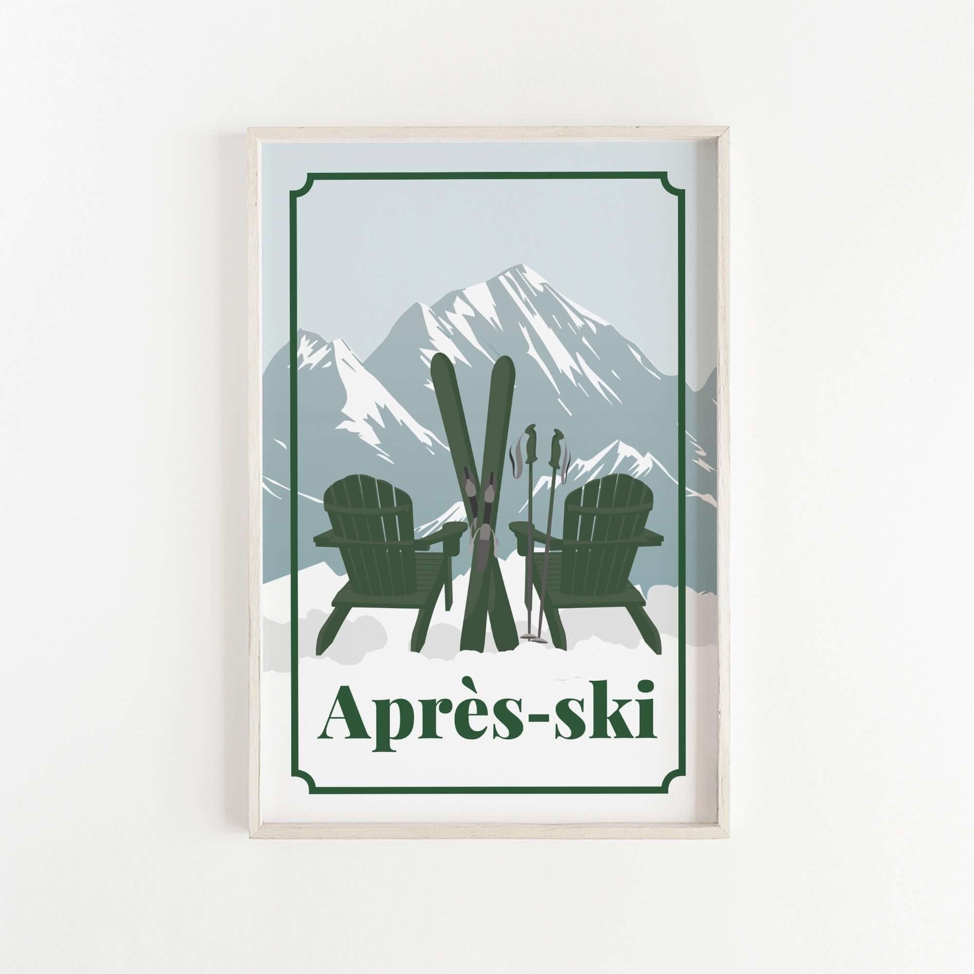 A framed print featuring a pair of green Adirondack chairs with skis and ski poles, set against a snowy mountain backdrop.