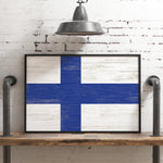 a wooden sign with a blue cross painted on it