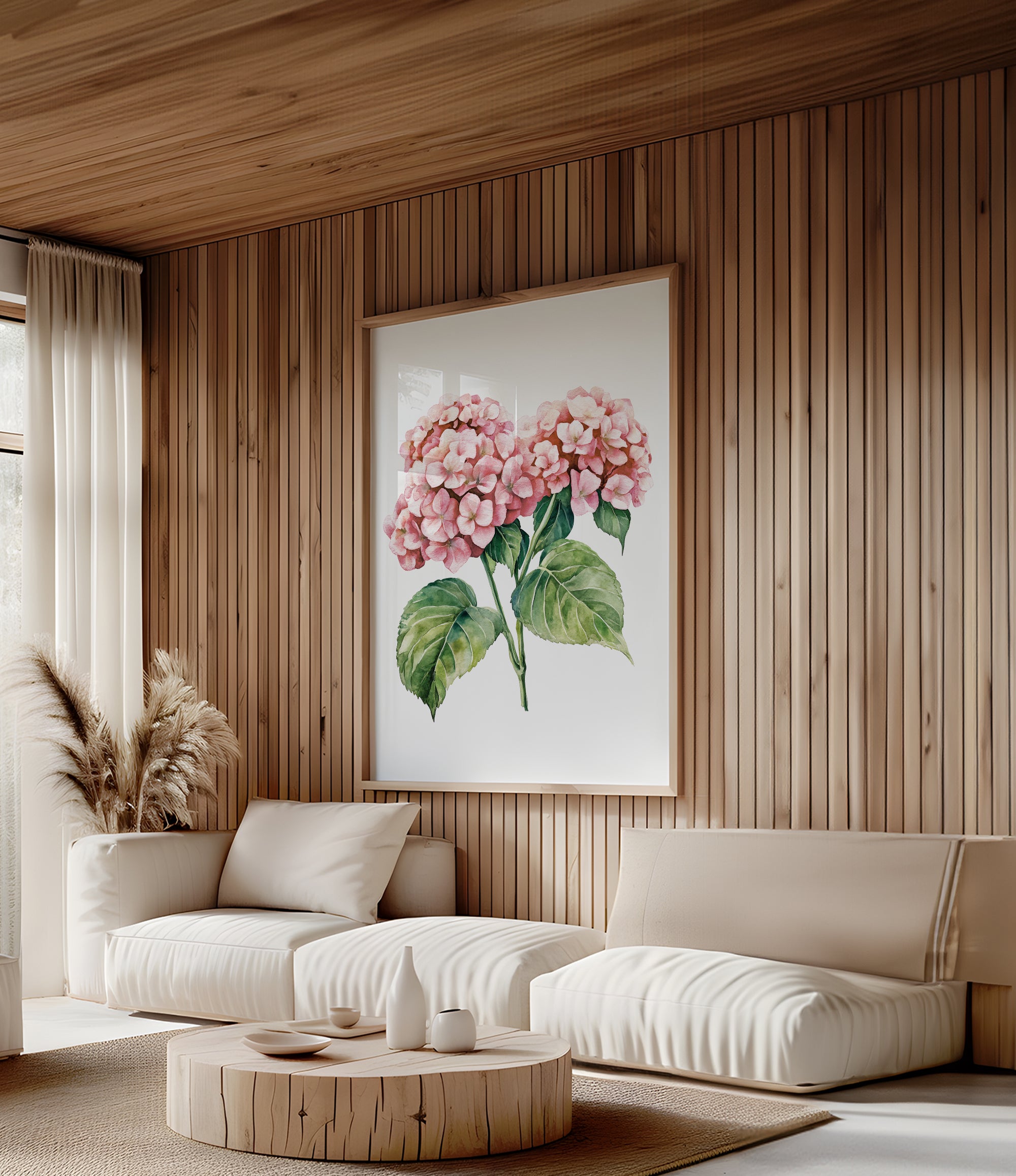 a cozy living room with a large floral painting hanging on the wall, featuring two pink hydrangeas with green leaves. The room is furnished with a sofa, a coffee table, and a potted plant, creating a warm and inviting atmosphere.