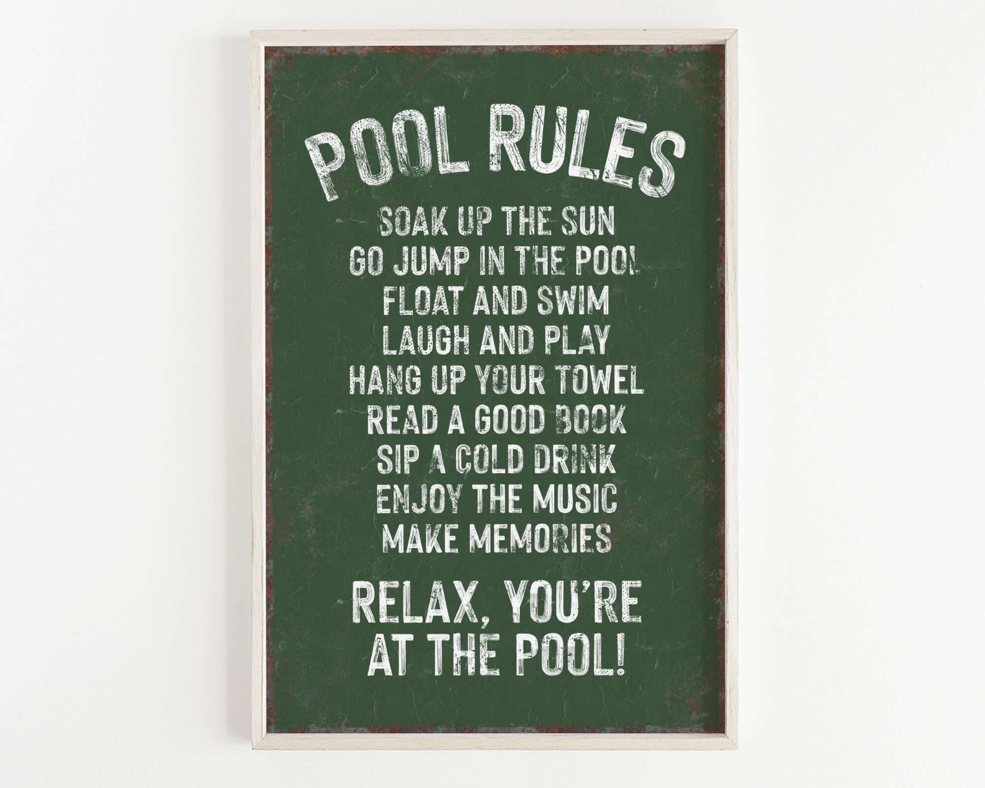 a green sign that says pool rules hanging on a wall