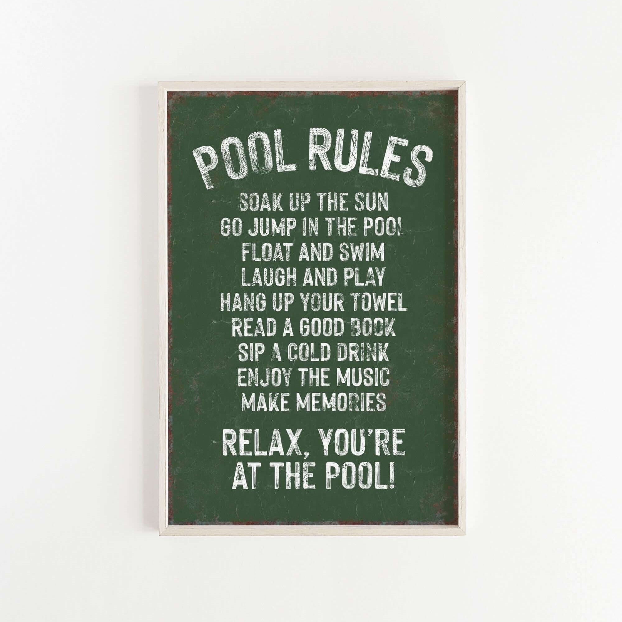 a green sign that says pool rules hanging on a wall