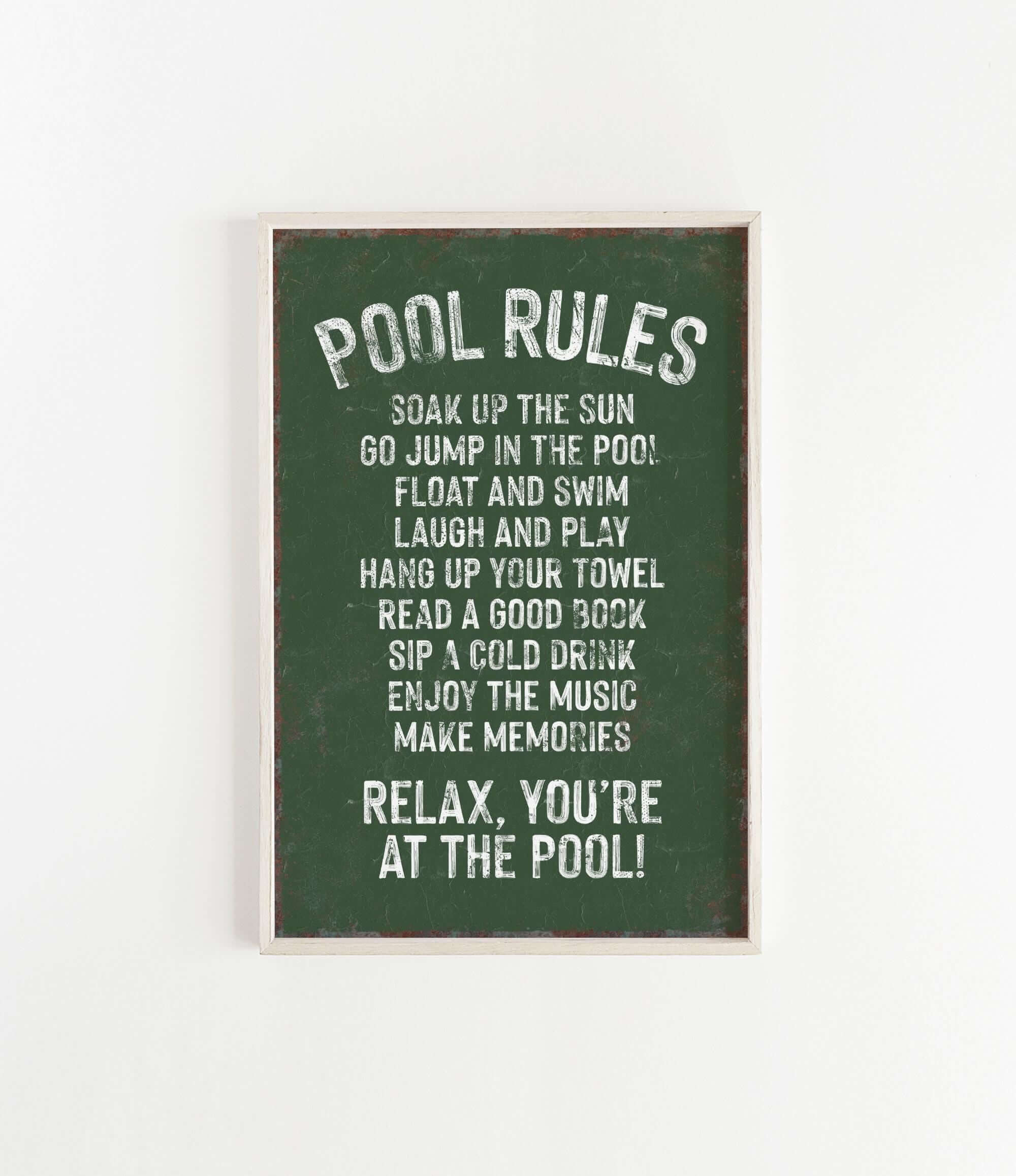a green sign that says pool rules hanging on a wall