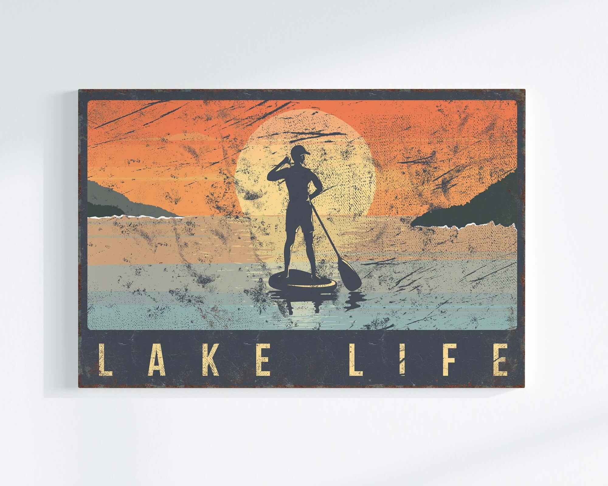 a picture of a man on a surfboard in front of a sunset