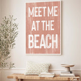 a wooden sign that says meet me at the beach