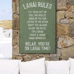 a sign that is on the side of a stone wall