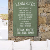 a sign that is on the side of a stone wall