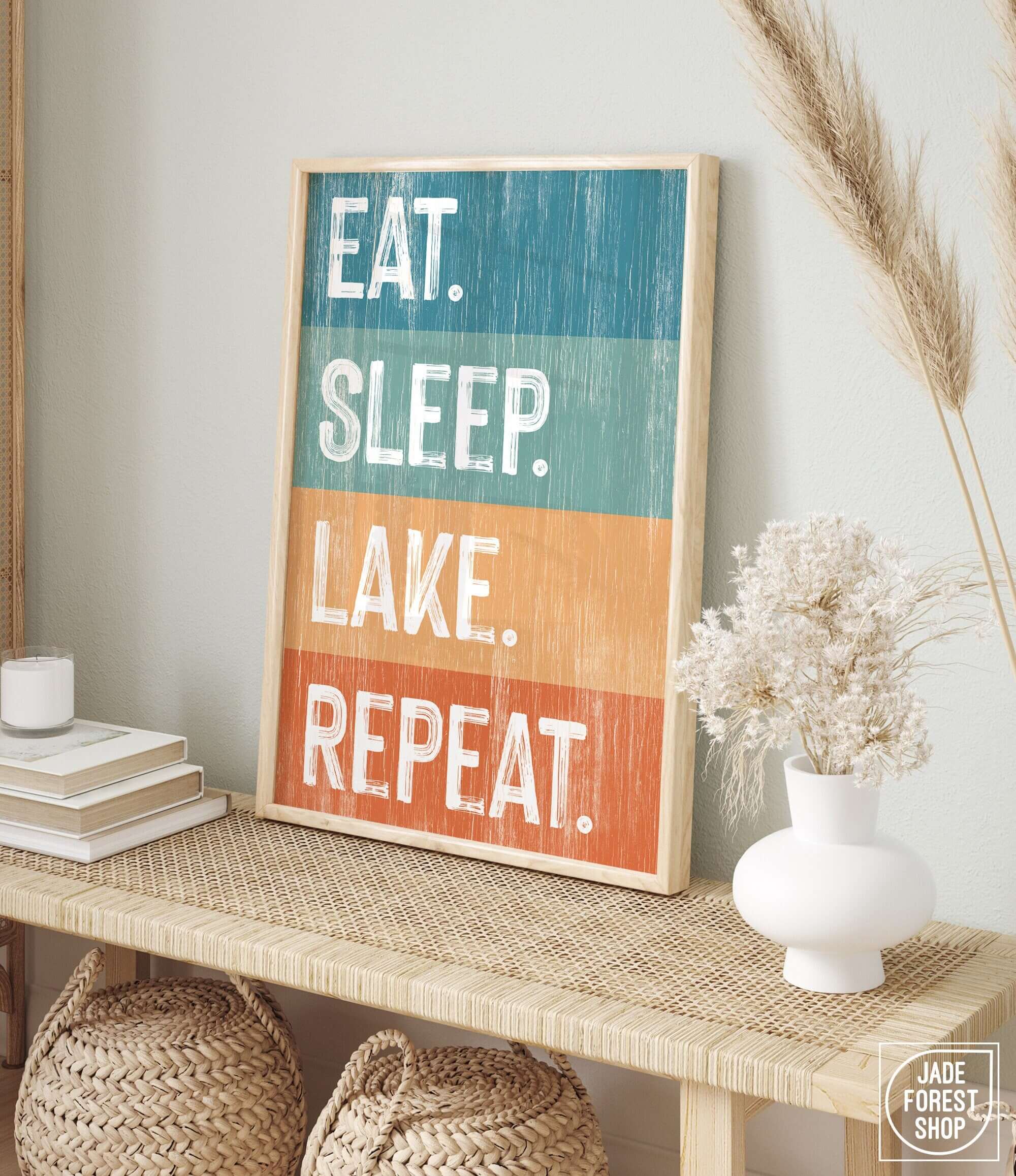 a picture of a sign that says eat sleep lake repeat