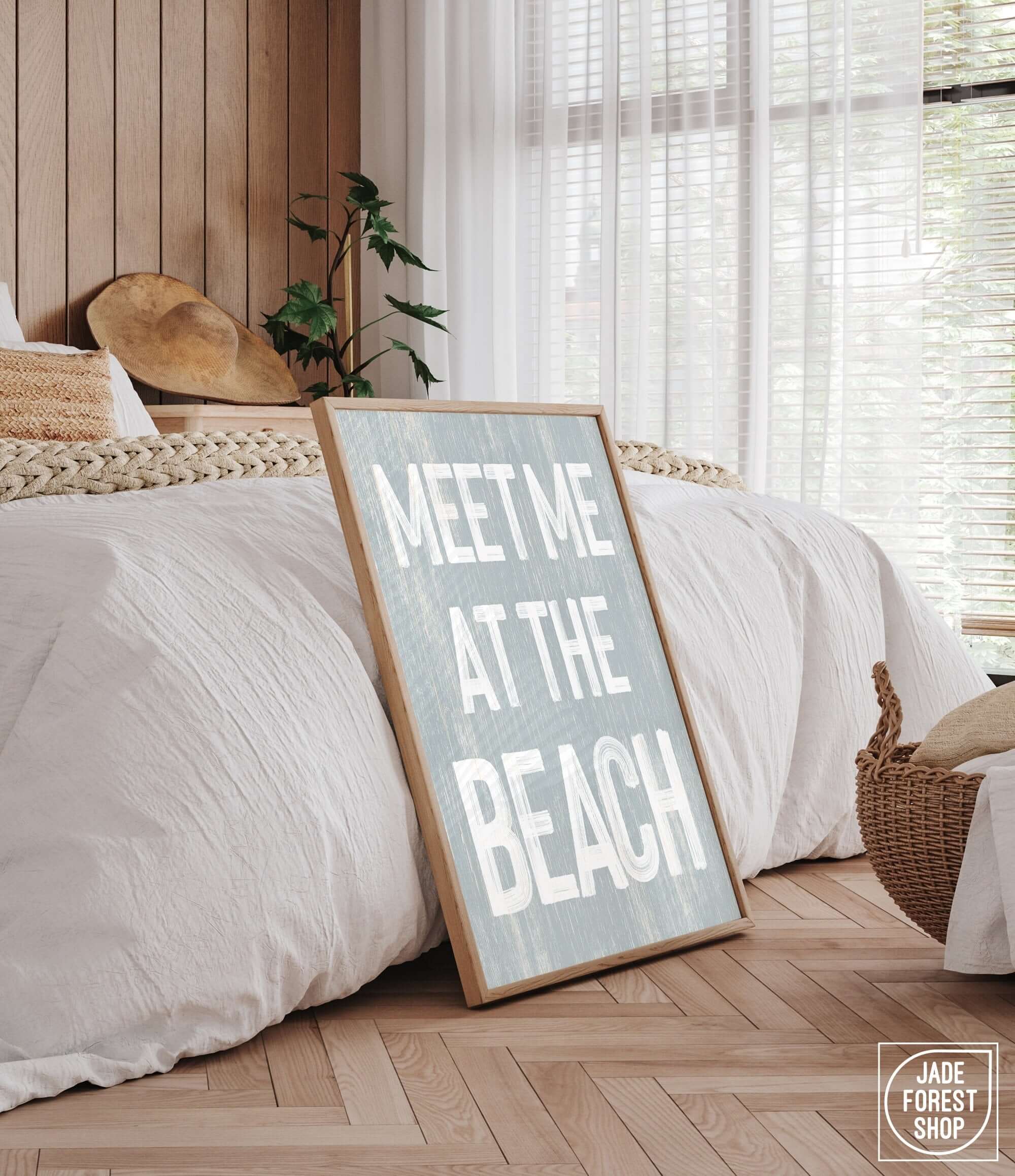 a bed with a sign that says meet me at the beach