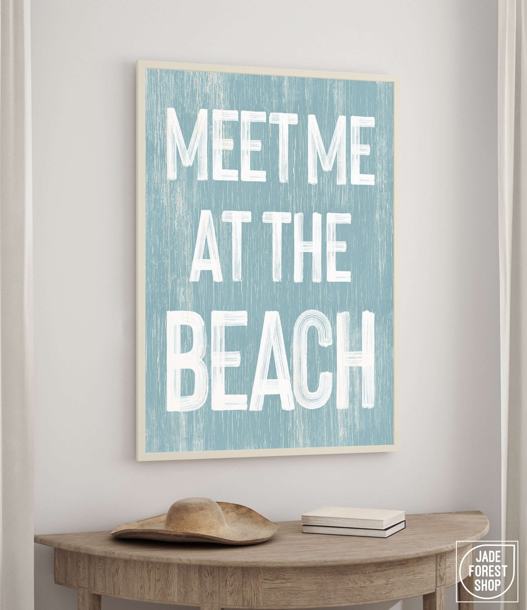 a blue and white sign that says meet me at the beach