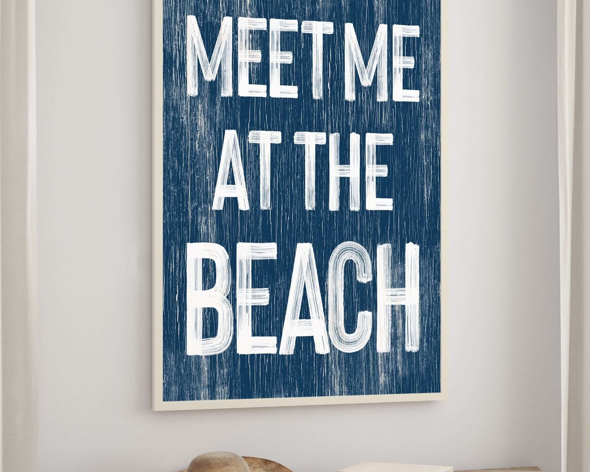a blue and white sign that says meet me at the beach