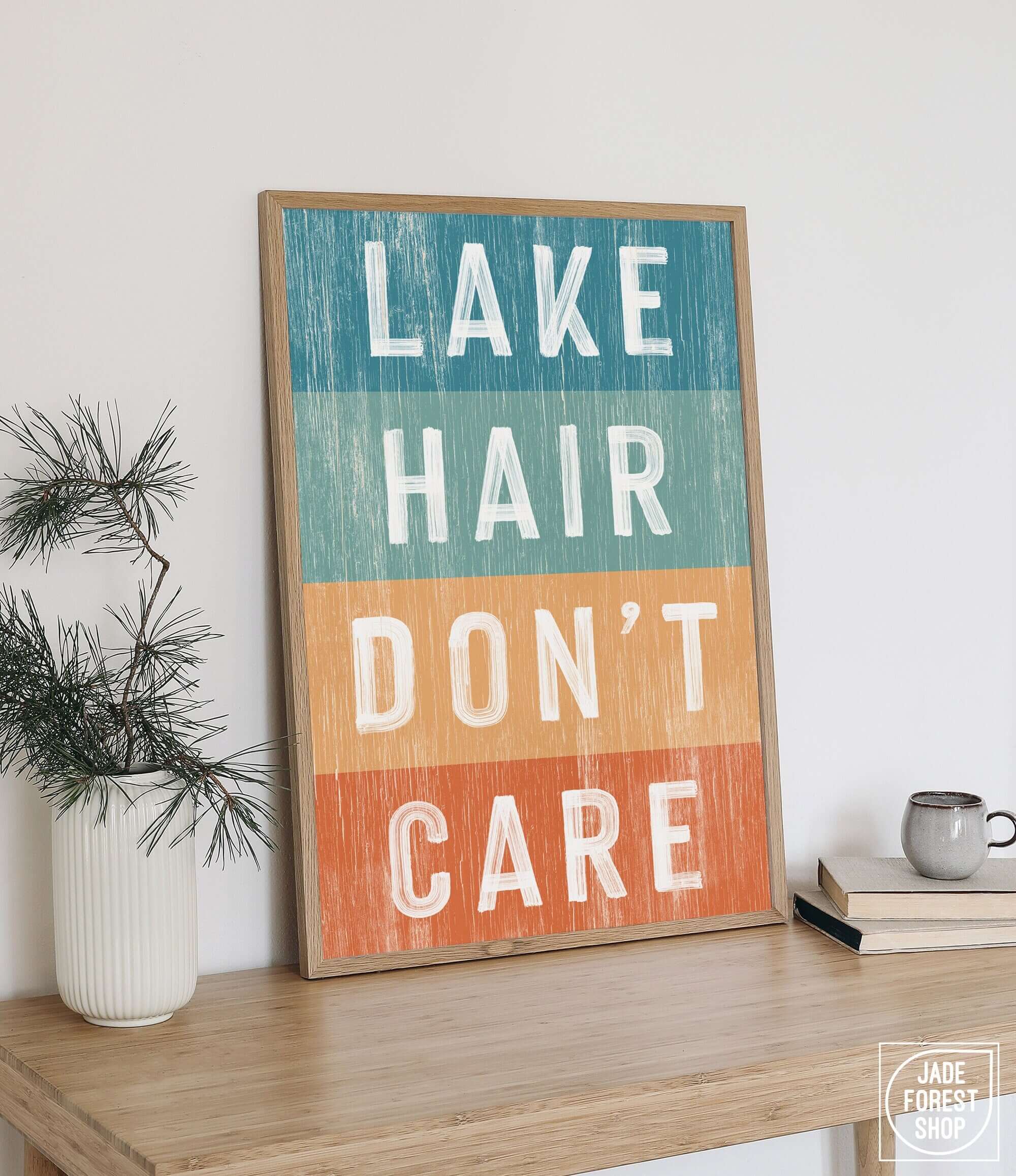 a wooden sign that says lake hair don't care