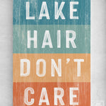 a wooden sign that says lake hair don't care