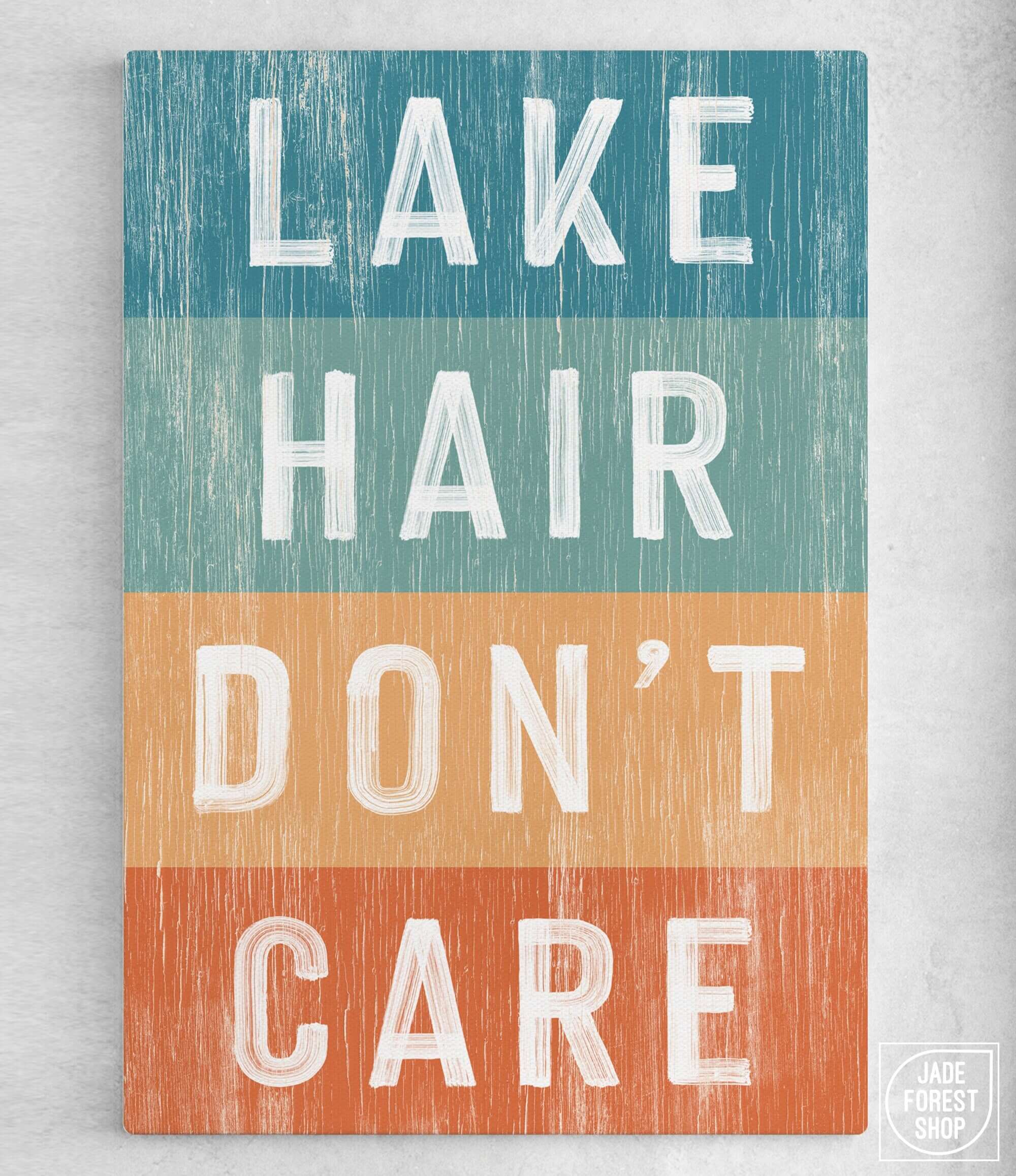 a wooden sign that says lake hair don't care